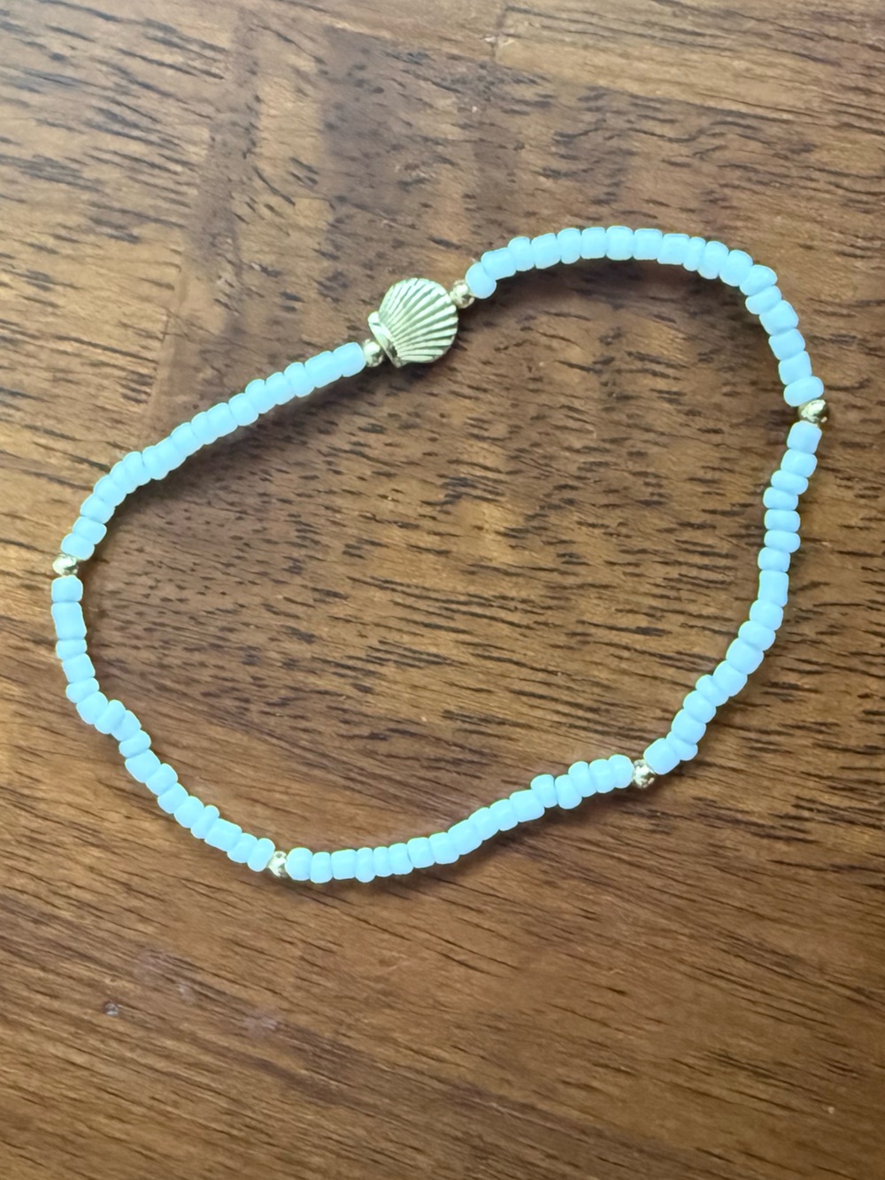 White Beaded Anklet with Gold Shell Accent